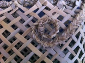Traditional Maori weaving, Raranga Maori, Kete Kai made from Harakeke, NewZealand flax. The Koru symbolises new beginnings.